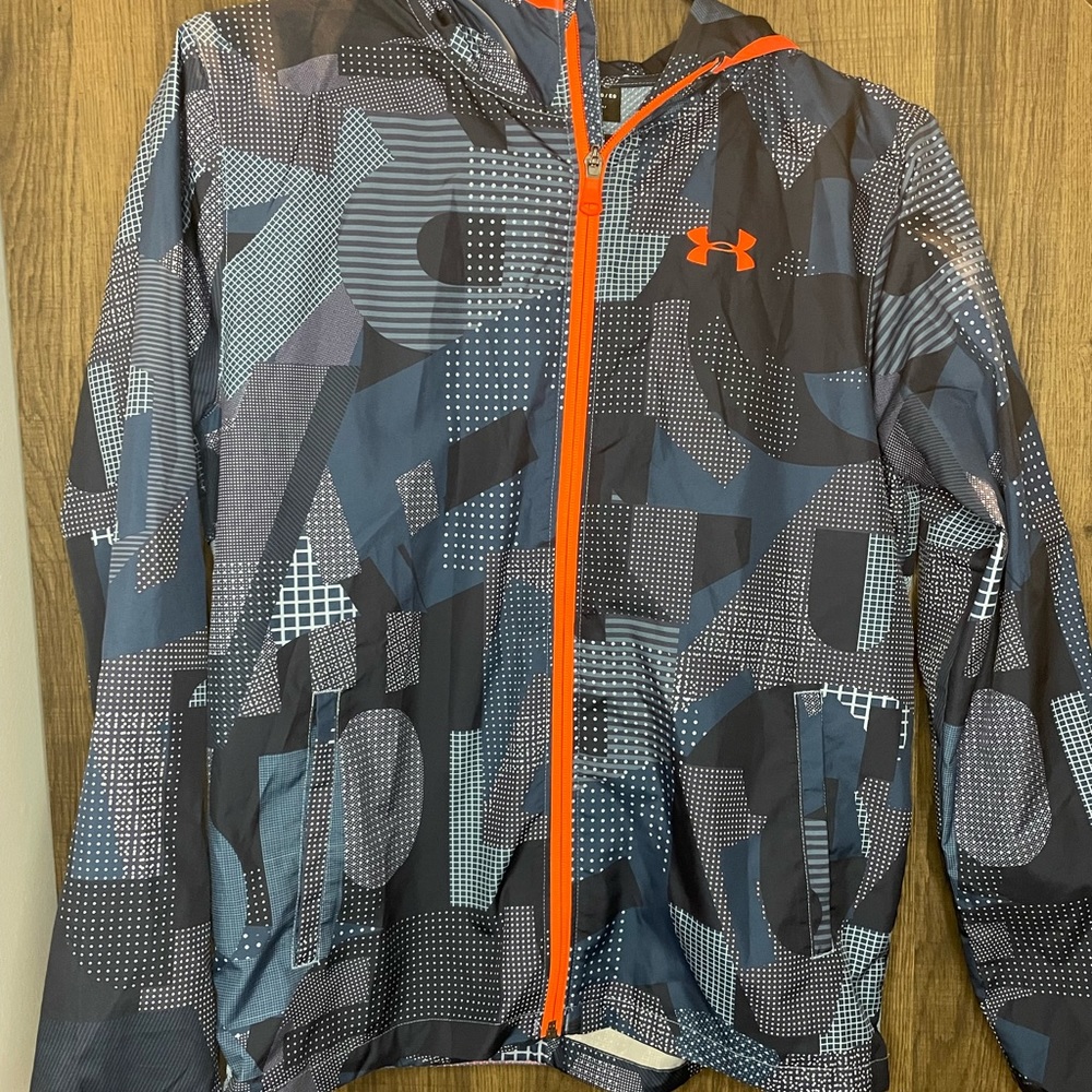 Youth large, Boys large, Blue and orange wind breaker.